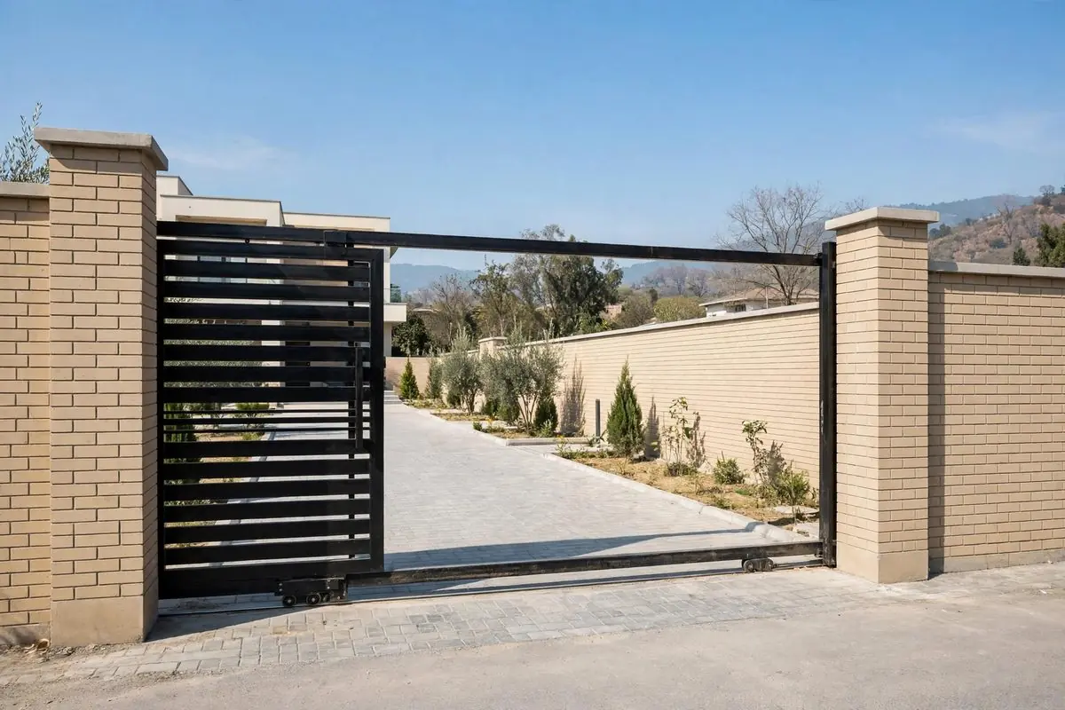 Automatic sliding gate at a Pakistani house entrance
